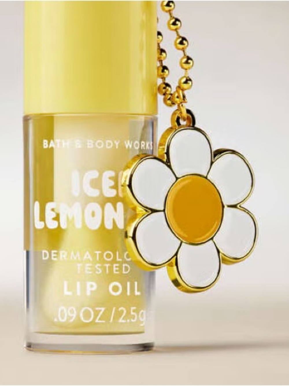 Bath & Body Works Yellow Lip Oil with Daisy Charm